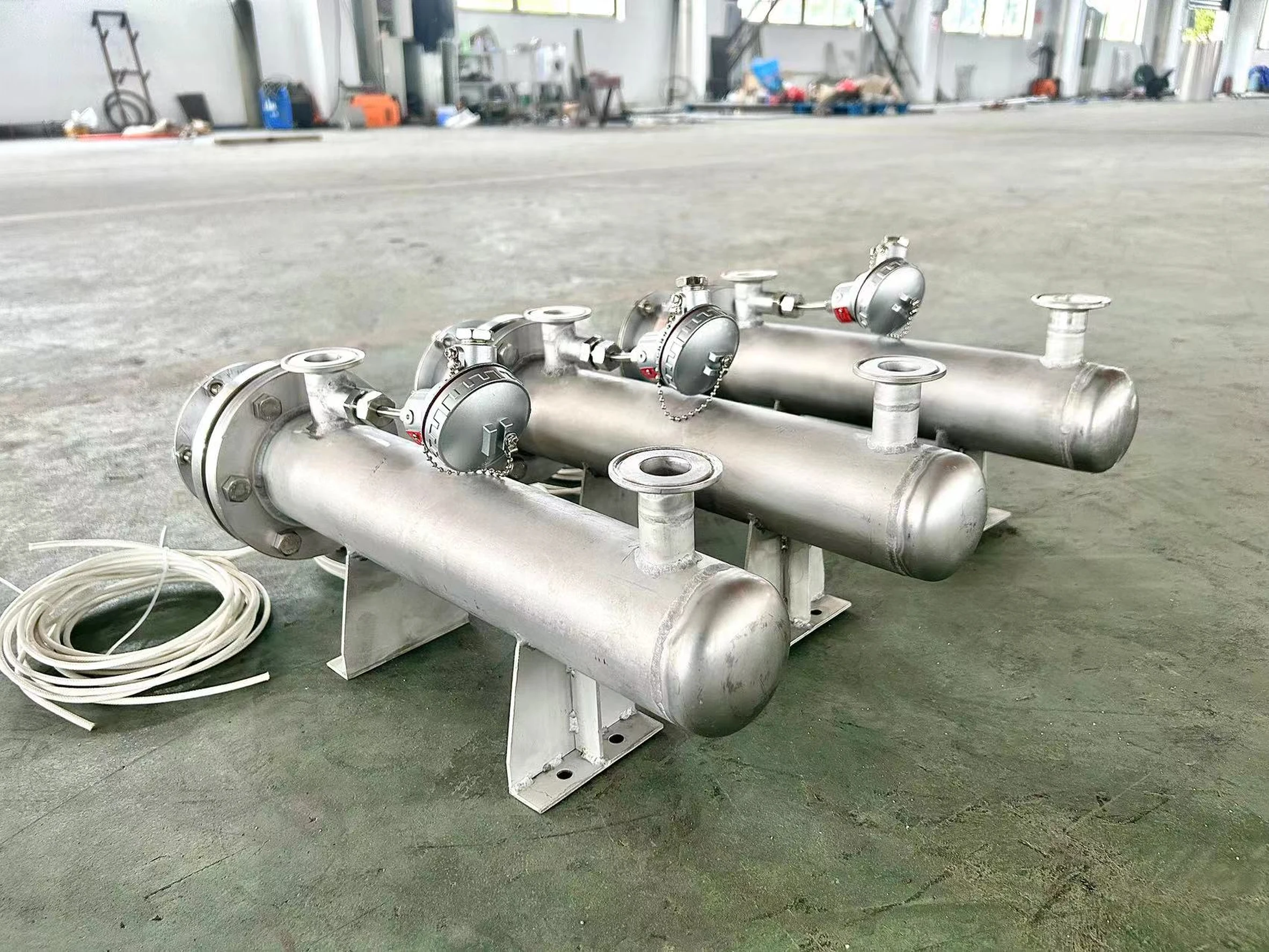 Electric inline water heaters for industrial process water systems