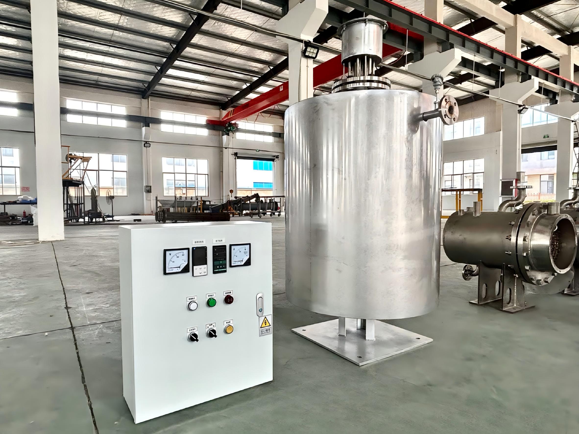 electric-liquid-process-fluid-heaters Electric tank heater with control cabinet for industrial liquid heating