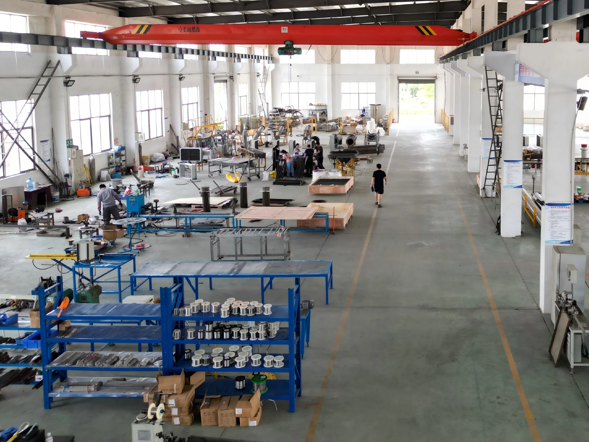 Industrial heater manufacturing workshop with production equipment and assembly area