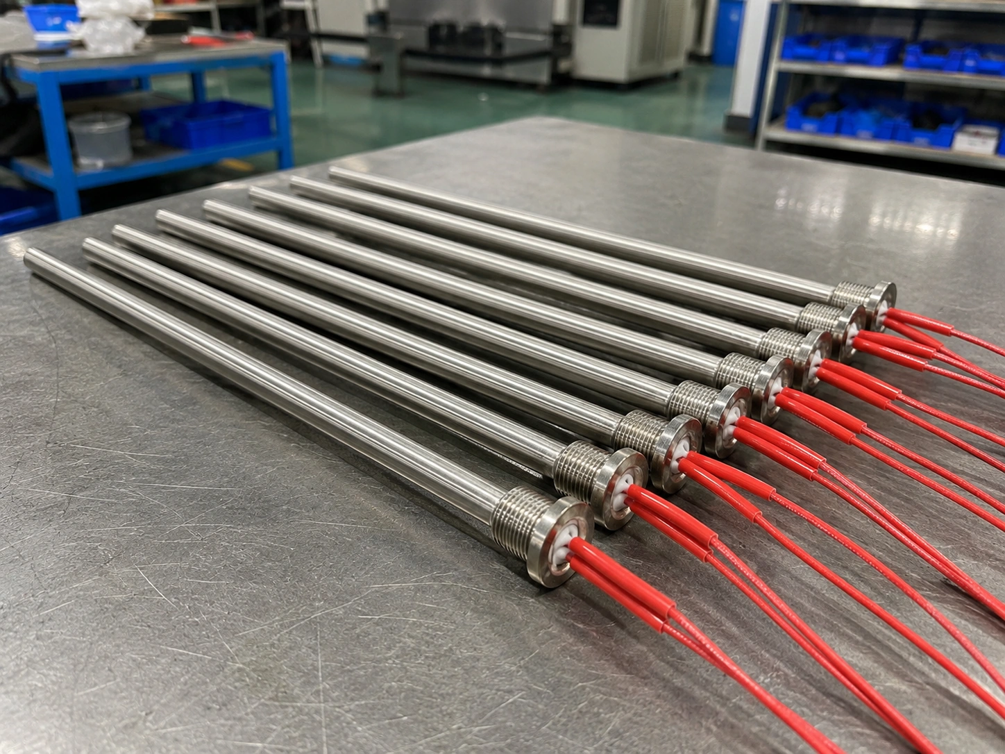 Stainless steel electric heater rod structure with cutaway detail and internal components