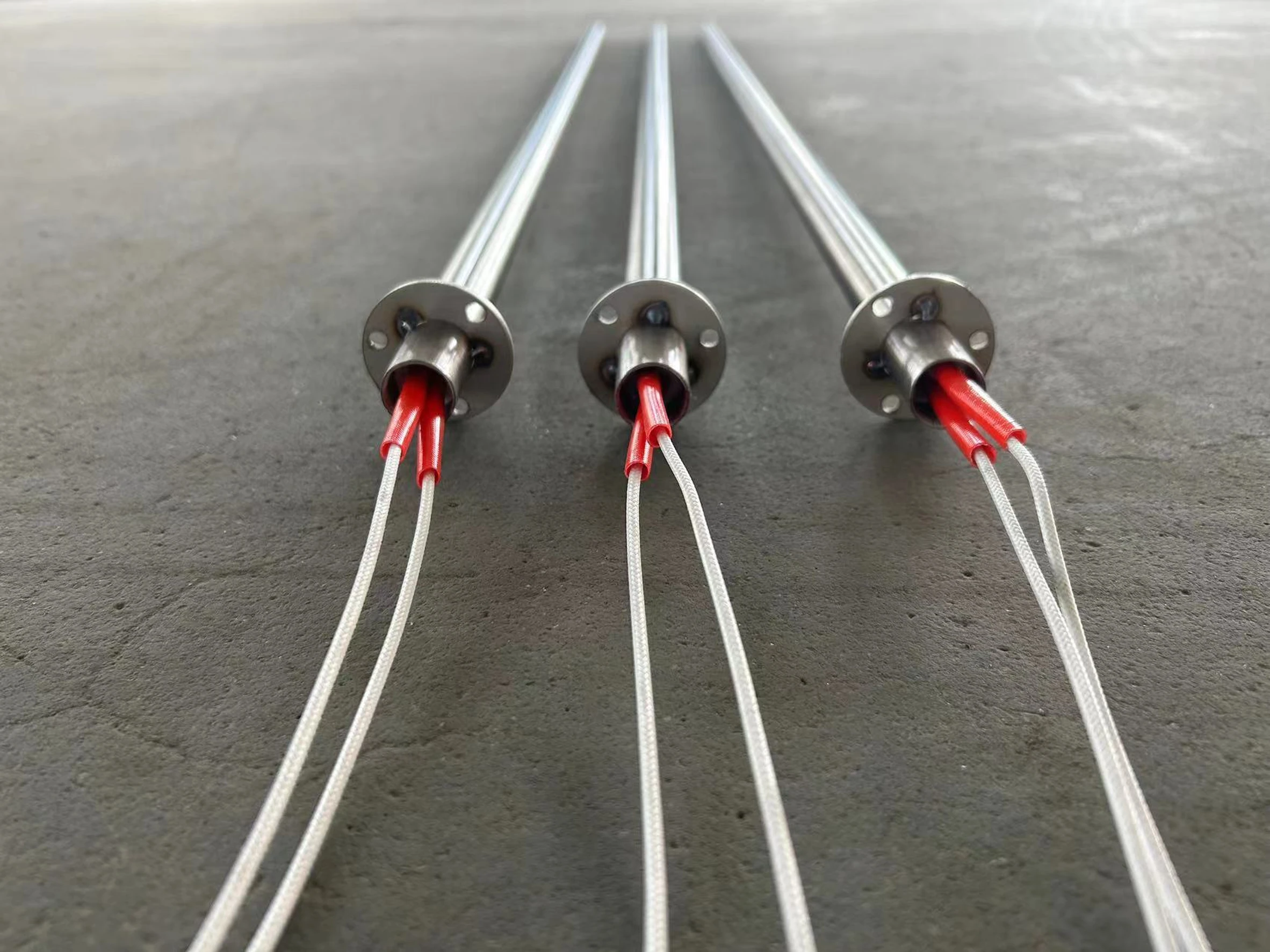 stainless steel electric heater rods with protected lead wires and mounting flanges